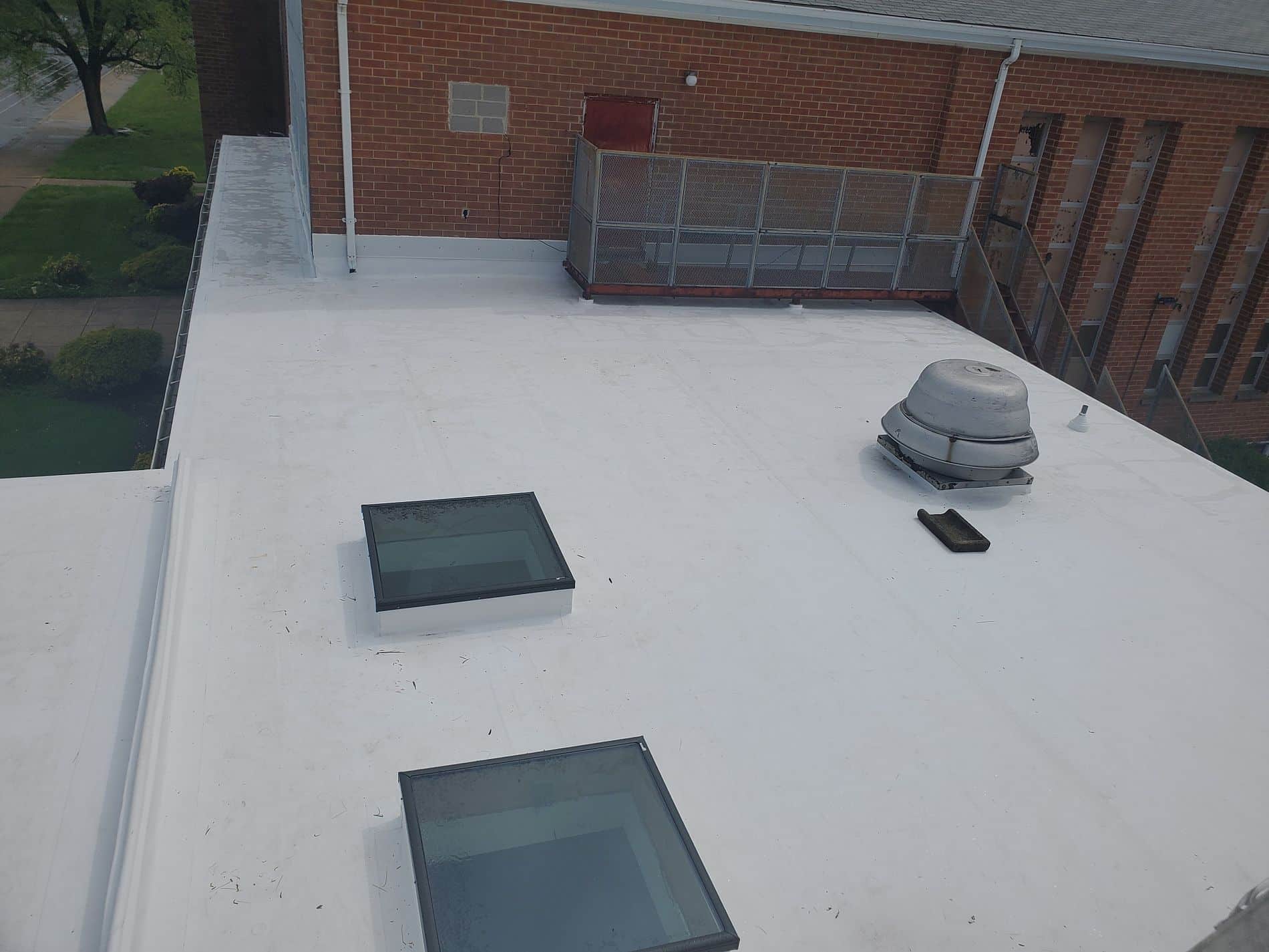 Newly installed flat roofing in Gaithersburg, MD's commercial building